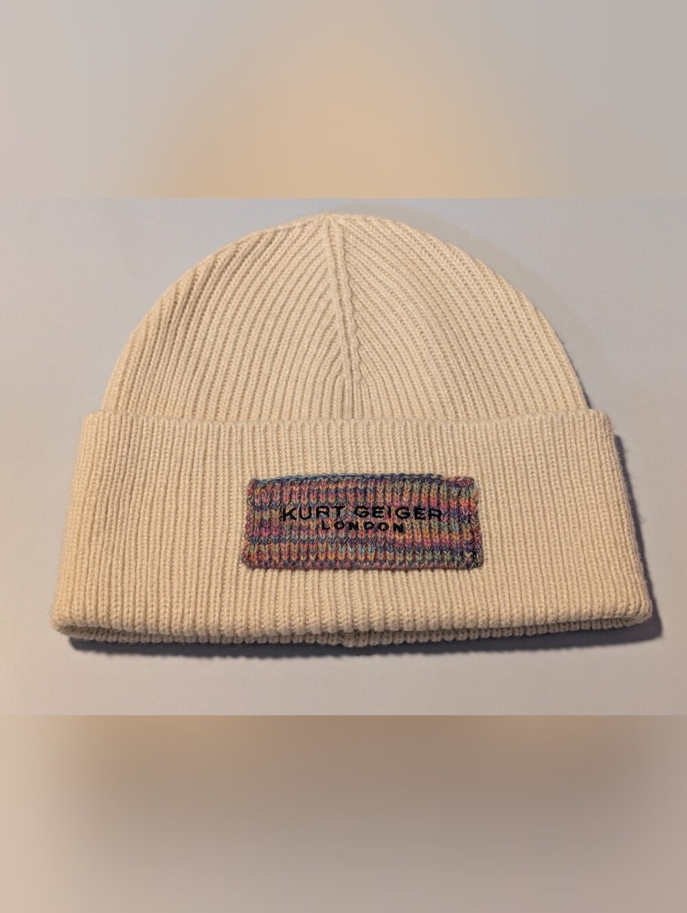 Kurt Geiger Cream Ribbed Fold-Over Beanie with Multicolor Patch
